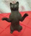S150 - Short Haired Black Sitting Up Cat